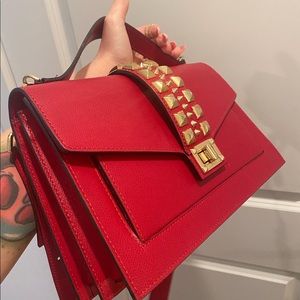Valentino cherry red Adrienne bag 
Never used. Paid $995 
Asking $625